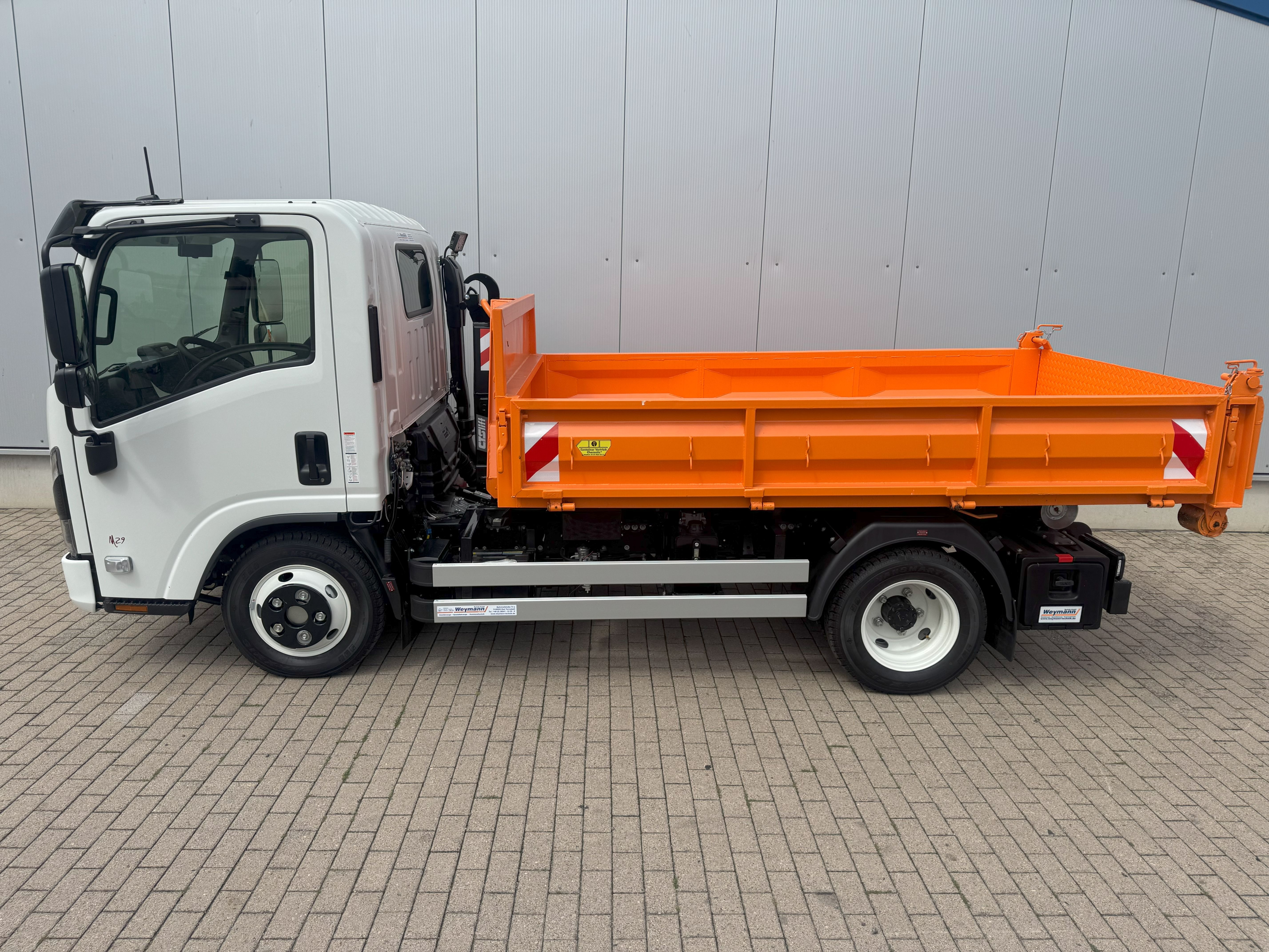 imgi_68_isuzu-m29-nmr-abrollkipper-cts-4