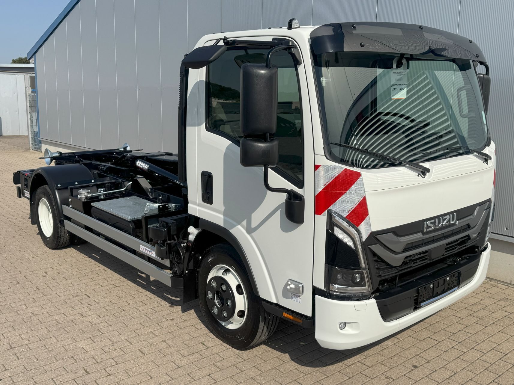 imgi_73_isuzu-npr-m30-abrollkipper-cts-3